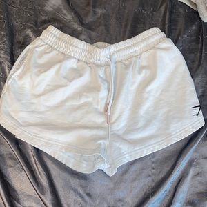 Gymshark throw on shorts small (white)